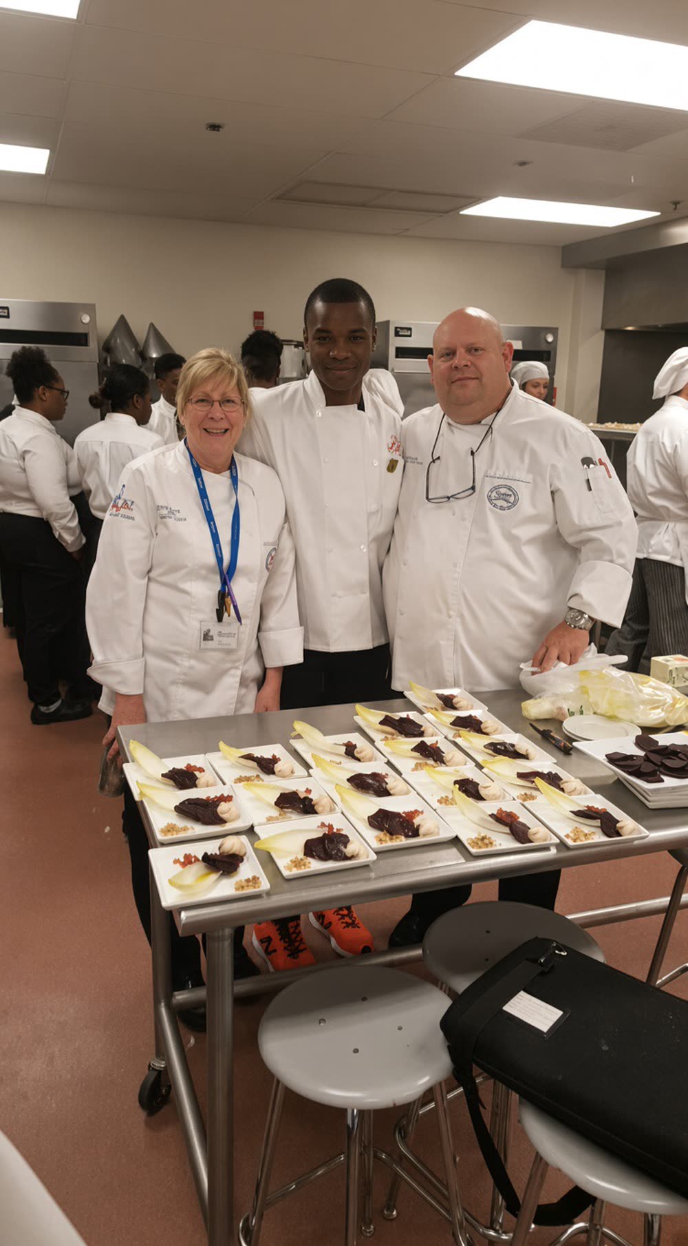 Chefs and contestants with the competition dishes
